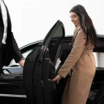 Executive car service Houston TX with black luxury limo and professional chauffeur