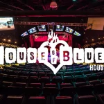 Luxury SUV from Houston Executive Transportation in front of House of Blues Houston