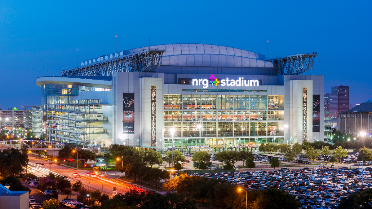Shuttle to NRG Stadium in black van with fans arriving
