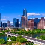 Luxury airport shuttle from Houston to College Station with chauffeur-driven black car